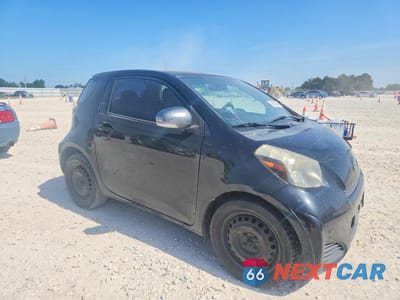 Czwarte zdjęcie samochodu z boku: 2013 SCION IQ BASE VIN:JTNJJXB01DJ023144 - miniatura