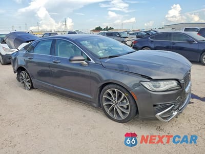 Czwarte zdjęcie samochodu z boku: 2019 LINCOLN MKZ RESERVE I VIN:3LN6L5LUXKR605378 - miniatura