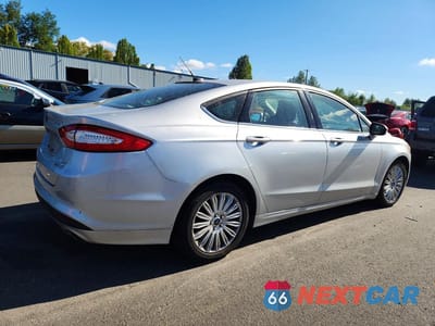 Trzecie zdjęcie samochodu z tyłu: 2015 FORD FUSION SE HYBRID VIN:3FA6P0LU4FR226996 - miniatura
