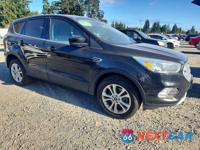 Czwarte zdjęcie samochodu z boku: 2017 FORD ESCAPE SE VIN:1FMCU9GD2HUC53853 - miniatura