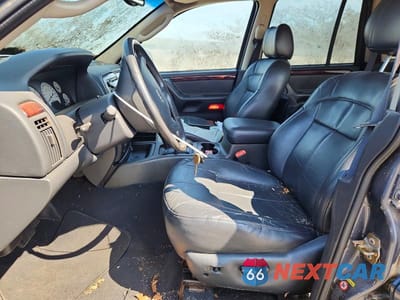 Zdjęcie 7 z 13 samochodu: 2002 JEEP GRAND CHEROKEE LIMITED VIN:1J8GW58NX2C225336 - miniatura