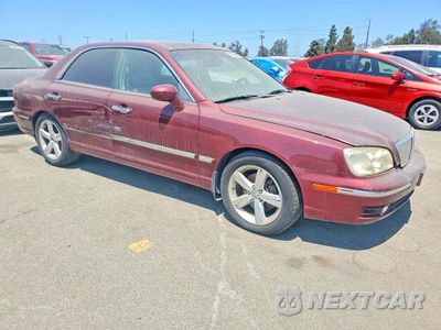 Czwarte zdjęcie samochodu z boku: 2004 HYUNDAI XG 350 VIN:KMHFU45E24A318921 - miniatura