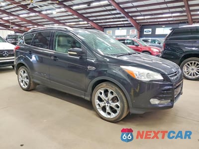 Czwarte zdjęcie samochodu z boku: 2014 FORD ESCAPE TITANIUM VIN:1FMCU9JX3EUD35203 - miniatura