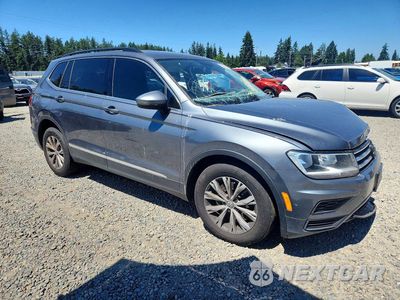 Czwarte zdjęcie samochodu z boku: 2018 VOLKSWAGEN TIGUAN SE VIN:3VV2B7AX9JM112075 - miniatura