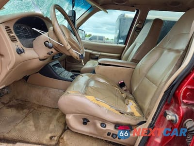 Zdjęcie 7 z 12 samochodu: 2001 FORD EXPLORER EDDIE BAUER VIN:1FMDU84PX1ZA52773 - miniatura