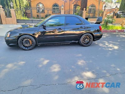 Zdjęcie 12 z 13 samochodu: 2004 SUBARU IMPREZA WRX STI VIN:JF1GD70694L521776 - miniatura