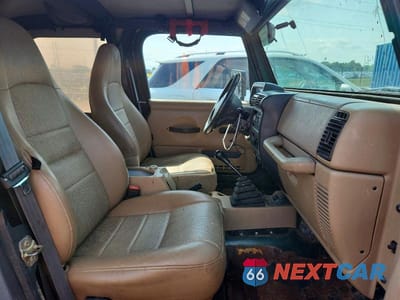 Zdjęcie 10 z 12 samochodu: 2000 JEEP WRANGLER / TJ SPORT VIN:1J4FA49S7YP712148 - miniatura