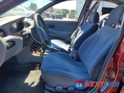 Zdjęcie 7 z 13 samochodu: 2000 HYUNDAI ELANTRA GLS VIN:KMHJF35F4YU964506 - miniatura