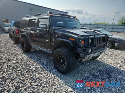 Czwarte zdjęcie samochodu z boku: 2004 HUMMER H2 VIN:5GRGN23U44H118018 - miniatura