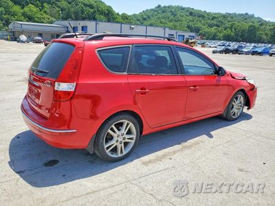 Trzecie zdjęcie samochodu z tyłu: 2010 HYUNDAI ELANTRA TOURING SE VIN:KMHDC8AE6AU052742 - miniatura