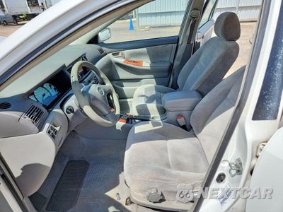Zdjęcie 7 z 12 samochodu: 2003 TOYOTA COROLLA CE VIN:1NXBR32E13Z142732 - miniatura
