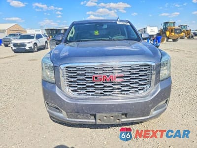 Piąte zdjęcie samochodu w środku: 2018 GMC YUKON XL DENALI VIN:1GKS2HKJXJR198689 - miniatura