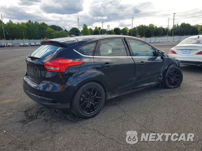 Trzecie zdjęcie samochodu z tyłu: 2018 FORD FOCUS TITANIUM VIN:1FADP3N24JL217873 - miniatura
