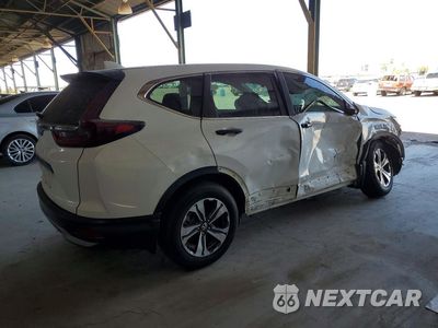 Trzecie zdjęcie samochodu z tyłu: 2020 HONDA CR-V LX VIN:5J6RW1H22LA013679 - miniatura