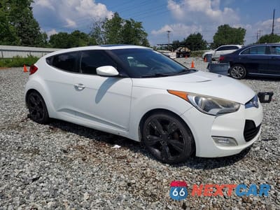 Czwarte zdjęcie samochodu z boku: 2012 HYUNDAI VELOSTER BASE VIN:KMHTC6AD8CU058908 - miniatura