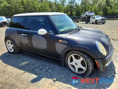Czwarte zdjęcie samochodu z boku: 2004 MINI COOPER VIN:WMWRC33404TC55976 - miniatura