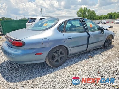 Trzecie zdjęcie samochodu z tyłu: 1999 FORD TAURUS SE VIN:1FAFP53U2XA116053 - miniatura