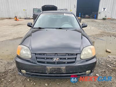 Piąte zdjęcie samochodu w środku: 2004 HYUNDAI ACCENT GL VIN:KMHCG35C04U303951 - miniatura