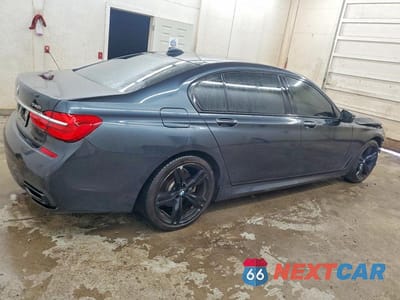 Trzecie zdjęcie samochodu z tyłu: 2019 BMW 740 I VIN:WBA7E2C53KB217310 - miniatura