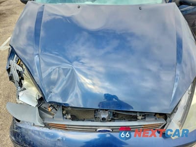 Zdjęcie 11 z 12 samochodu: 2003 FORD FOCUS LX VIN:1FAFP33PX3W267816 - miniatura