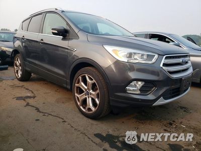 Czwarte zdjęcie samochodu z boku: 2018 FORD ESCAPE TITANIUM VIN:1FMCU9J92JUA15043 - miniatura