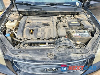 Zdjęcie 11 z 12 samochodu: 2008 KIA OPTIMA LX VIN:KNAGE123985238969 - miniatura