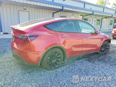 Trzecie zdjęcie samochodu z tyłu: 2023 TESLA MODEL Y VIN:7SAYGDEE7PA052182 - miniatura