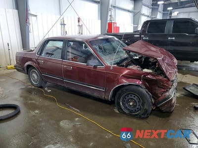 Czwarte zdjęcie samochodu z boku: 1990 BUICK CENTURY LIMITED VIN:1G4AL54N7L6409950 - miniatura