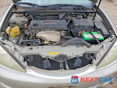 Zdjęcie 11 z 12 samochodu: 2003 TOYOTA CAMRY LE VIN:JTDBE32K230169676 - miniatura