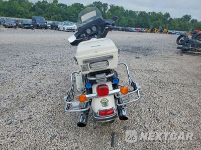 Czwarte zdjęcie samochodu z boku: 2010 HARLEY-DAVIDSON FLHTP VIN:1HD1FMM14AB661192 - miniatura