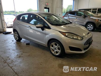 Czwarte zdjęcie samochodu z boku: 2015 FORD FIESTA SE VIN:3FADP4EJ2FM196329 - miniatura