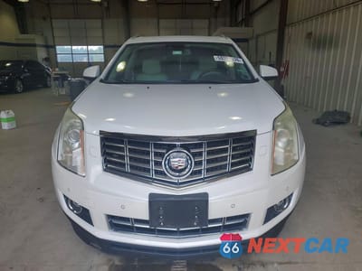 Piąte zdjęcie samochodu w środku: 2014 CADILLAC SRX PREMIUM COLLECTION VIN:3GYFNDE37ES611708 - miniatura