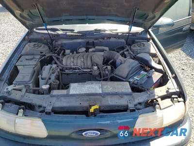 Zdjęcie 11 z 12 samochodu: 1994 FORD TAURUS GL VIN:1FALP52U4RA134528 - miniatura