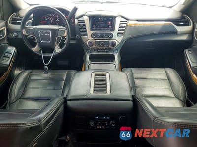 Zdjęcie 8 z 13 samochodu: 2015 GMC YUKON DENALI VIN:1GKS1CKJ1FR528619 - miniatura