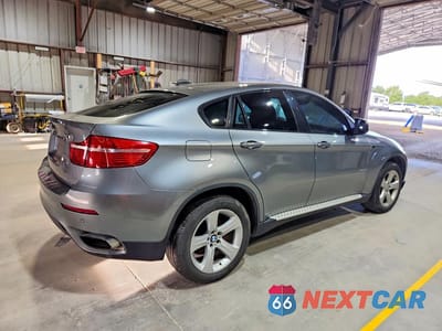 Trzecie zdjęcie samochodu z tyłu: 2010 BMW X6 XDRIVE50I VIN:5UXFG8C5XALZ94652 - miniatura