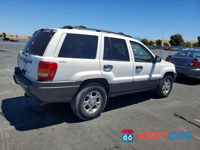 Trzecie zdjęcie samochodu z tyłu: 2000 JEEP GRAND CHEROKEE LAREDO VIN:1J4GW48S6YC114132 - miniatura
