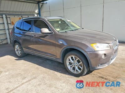 Czwarte zdjęcie samochodu z boku: 2011 BMW X3 XDRIVE35I VIN:5UXWX7C51BL732174 - miniatura