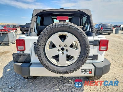 Zdjęcie 6 z 12 samochodu: 2012 JEEP WRANGLER UNLIMITED SAHARA VIN:1C4BJWEG2CL180910 - miniatura