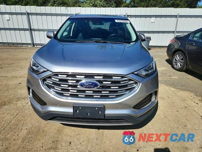 Piąte zdjęcie samochodu w środku: 2020 FORD EDGE TITANIUM VIN:2FMPK4K93LBA76726 - miniatura