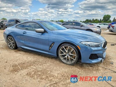 Czwarte zdjęcie samochodu z boku: 2019 BMW M850XI VIN:WBABC4C57KBJ35768 - miniatura