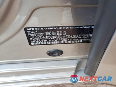 Zdjęcie 12 z 12 samochodu: 2013 BMW 7ER 750 LXI VIN:WBAYF8C5XDDE59378 - miniatura