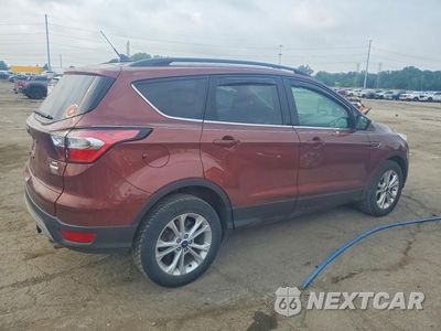 Trzecie zdjęcie samochodu z tyłu: 2018 FORD ESCAPE SEL VIN:1FMCU0HD6JUA03595 - miniatura