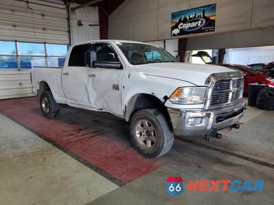 Czwarte zdjęcie samochodu z boku: 2012 DODGE RAM 2500 SLT VIN:3C6UD5DL8CG173702 - miniatura