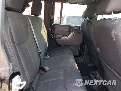 Zdjęcie 10 z 13 samochodu: 2015 JEEP WRANGLER UNLIMITED SPORT VIN:1C4BJWDG0FL612139 - miniatura