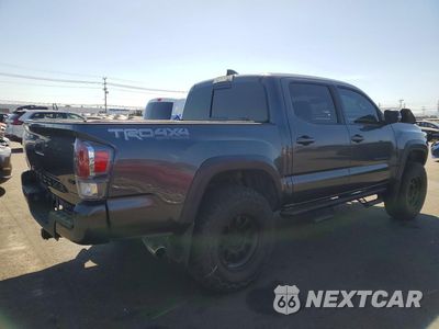 Trzecie zdjęcie samochodu z tyłu: 2022 TOYOTA TACOMA TRD OFF-ROAD VIN:3TMCZ5AN8NM507808 - miniatura