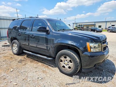 Czwarte zdjęcie samochodu z boku: 2011 CHEVROLET TAHOE K1500 LT VIN:1GNSKBE06BR347667 - miniatura