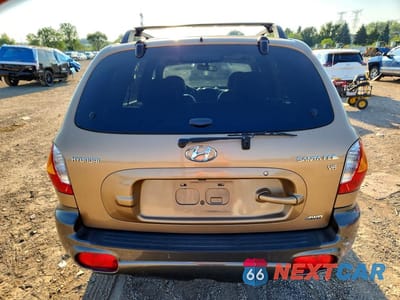 Zdjęcie 6 z 13 samochodu: 2002 HYUNDAI SANTA FE GLS VIN:KM8SC73D32U314028 - miniatura