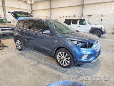 Czwarte zdjęcie samochodu z boku: 2018 FORD ESCAPE TITANIUM VIN:1FMCU9J98JUC04621 - miniatura