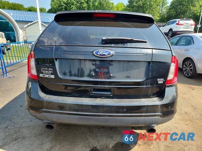 Zdjęcie 6 z 14 samochodu: 2014 FORD EDGE SEL VIN:2FMDK4JC3EBA93559 - miniatura