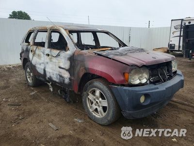 Czwarte zdjęcie samochodu z boku: 2007 JEEP GRAND CHEROKEE LAREDO VIN:1J8GR48K07C602352 - miniatura